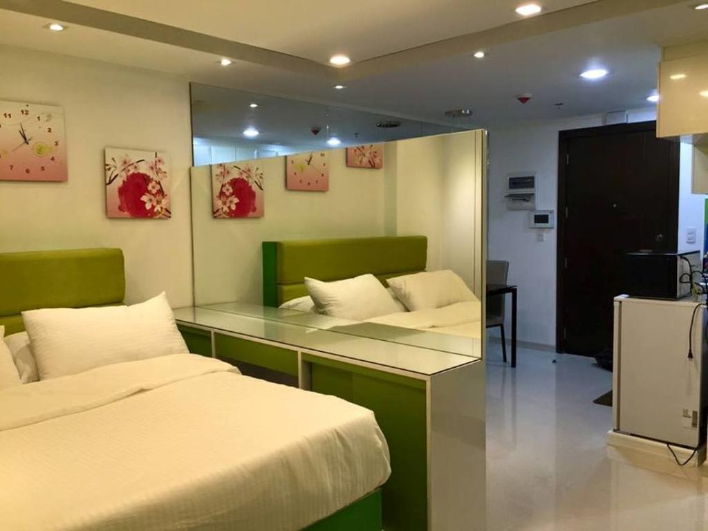 One Palm Tree Condo Manilla Kamer foto